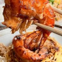 Pad Thai Bo Ran · Stir-fried rice noodles in tamarind sauce with jumbo prawns, shrimp paste, bean sprouts, chi...