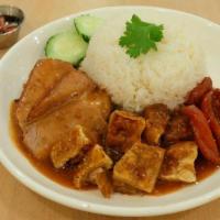 Khao Moo Dang · Roasted pork, crispy pork belly, Thai sweet sausage, and boiled egg over rice topped with ho...