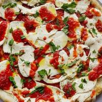 18In Margherita Pizza · Round pie made with homemade fresh mozzarella, plum tomato sauce, basil & EVOO.