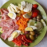 Sm Cold Antipasto · Prosciutto, salami, soppressata, provolone, fresh mozzarella, tomatoes, olives, mushrooms & ...