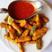 Fried Zucchini Sticks · Zucchini sticks dipped in an egg mixture with bread crumbs, parmesan cheese, baking powder, ...