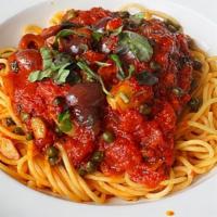 Capellini Puttanesca · Marinara sauce with black olives, capers & anchovies.