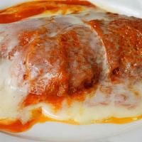 Chicken Parmigiana · Breaded, fried & topped with tomato sauce and melted mozzarella.