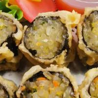 Tempura Potato Noodle Roll · Potato vermicelli, bell pepper, onion wrapped in seaweed with a sweet chili sauce on the sid...
