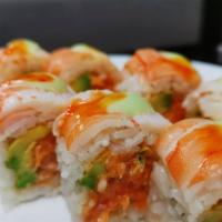 King Ken Roll · Lobster salad, spicy salmon, avocado, wrapped in soybean paper, topped with shrimp& special ...