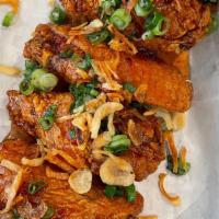 6 Piece Rooster Wings · Fried chicken wing with garlic chili dressing.