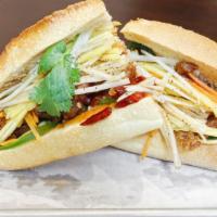 Veggie Banh Mi · Seasoned soy protein (no mayo) with cucumber, pickled daikon and carrot