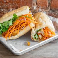 Beer Batter Fish Banh Mi · Crispy swai with optional black pepper glaze with mayo dressing, cucumber, cilantro, pickled...