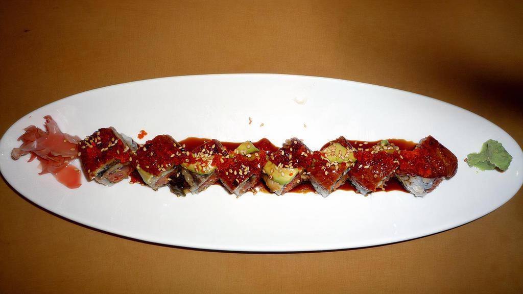 Crazy Roll · Spicy crunch yellowtail, cucumber inside, topped with eel, avocado & caviar.