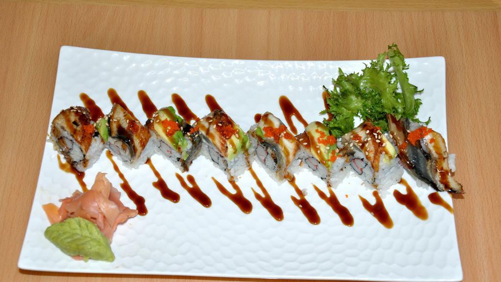 Tiger Roll · Crab stick tempura inside with eel, avocado and caviar on top.