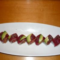 Toms Roll · Spicy crunchy tuna, cucumber inside, pepper tuna and avocado on top.