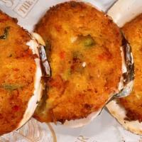 New England Stuffed Clams(3) · Breaded Stuffed Clams with signature spice blend.