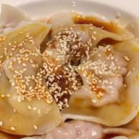Szechuan Pork Dumpling With Roasted Chili Soy (8 Pcs) · 