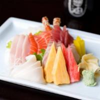 Chirashi Sushi (18Pcs) · Assorted fresh fish over sushi rice