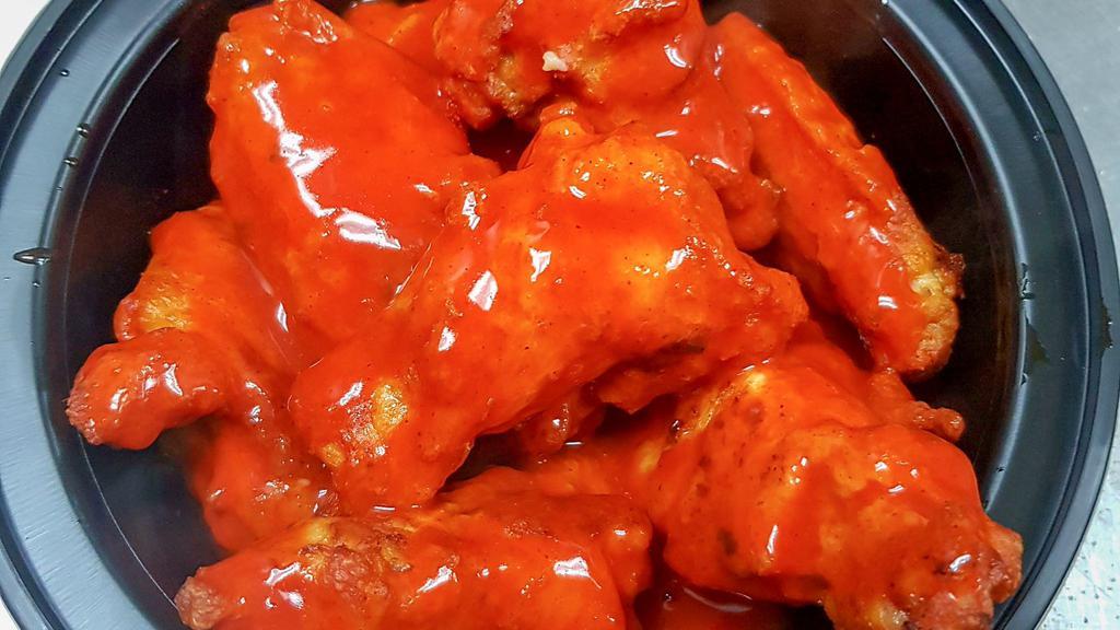 Buffalo Chicken Wings · Eight pieces oven roasted wings with a hot buffalo sauce. 560 cal.