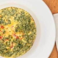 Fritatta Coppa · A traditional Italian omelette with eggs and a variety of fillings.