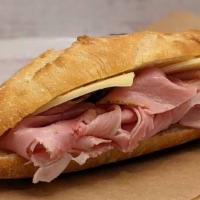 Ham & Cheese Baguette · A classic combination of ham & swiss cheese, served on a baguette.