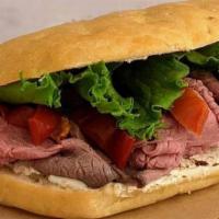 Roast Beef · Tender roast beef, garlic & herb cheese, and spicy goathorn peppers, served on our Tuscan sa...