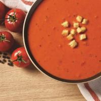 Creamy Tomato Soup · A delicious medley of tomatoes, cream, spices and garlic all simmered in a rich broth.