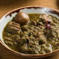 Ghourmeh Sabzi Dinner · Parsley and scallions simmered with chunks of beef, red kidney beans, and dried lemons. Serv...