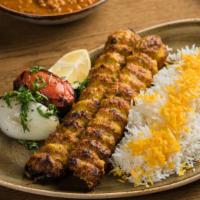 Chicken Koobideh Kebob Dinner · Two skewers of juicy chopped chicken flavored with saffron. Served with basmati rice, grille...