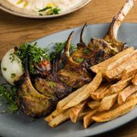Lamb Chops Kebob Dinner · Five single cut rack of lamb, marinated in a special age-old recipe. Served with basmati ric...