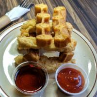 Chicken ‘N’ Waffle Fingers · crispy fried strips of chicken breast & waffles with Vermont maple syrup