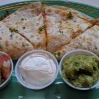 Blackened Shrimp Quesadillas · Guacamole, sour cream and pico de gallo on the side.