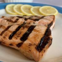Chilean Sea Bass Portofino · Broiled and sautéed with lemon, white wine and butter, capers, sun-dried tomatoes and rock s...