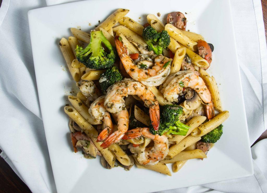 Shrimp Siciliano · Penne, smoked sausage, sun-dried tomato, mushroom, red pepper, green onion & broccoli sautéed in a garlic-pesto sauce