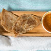#1. Malaysian Homemade Roti Canai · Spicy. Malaysian crispy Indian style pancake served with curry chicken and potato dipping sa...