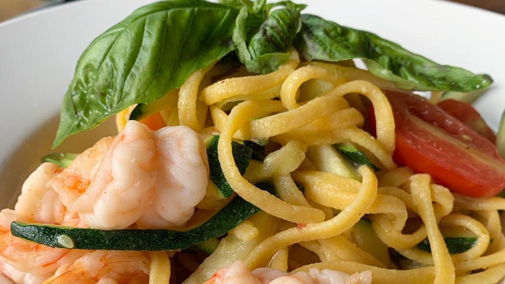 Linguine Con Gamberetti · Homemade pasta with shrimp, zucchini, cherry tomatoes, garlic & olive oil