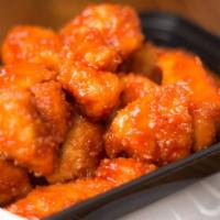 Fire Poppers · Hot. Deep fried sliced white meat chicken in chef's special sauce.