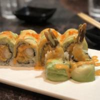 Tiger Roll · Spicy salmon, crunchy cucumber inside topped with fresh yellowtail, avocado and wasabi, mayo...