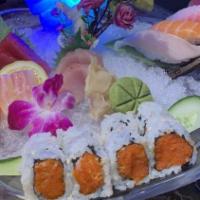 Prince Roll · Shrimp tempura, spicy kani, avocado wrapped in soy bean paper, topped with fresh salmon and ...