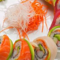 Rainbow Roll · Kani, cucumber, avocado, inside topped with salmon, tuna, white fish, avocado.