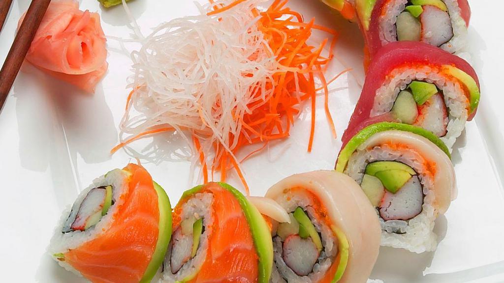 Rainbow Roll · california roll inside, tuna salmon, white fish avocado on top