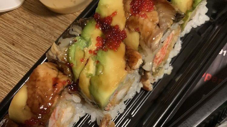 Spiderman Roll · Soft shell, crab tempura, lettuce, avocado inside topped with spicy tuna and eel, eel sauce, spicy mayo.