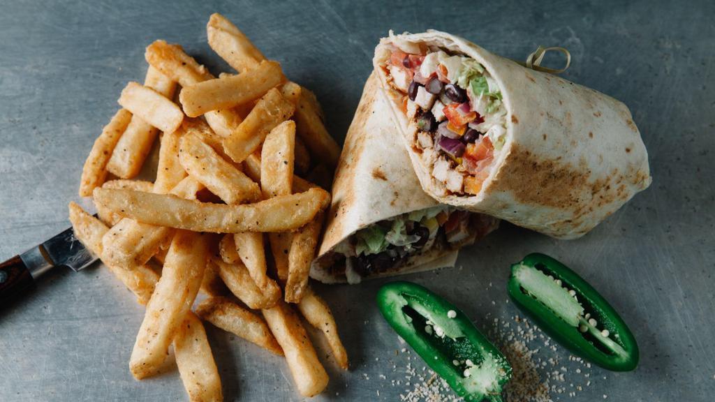 Arizona Wrap · Chicken cutlet with pepper jack cheese, hot peppers, lettuce, tomatoes, and herb mayo, along with deli chips and pickles. A choice of wrap is required.