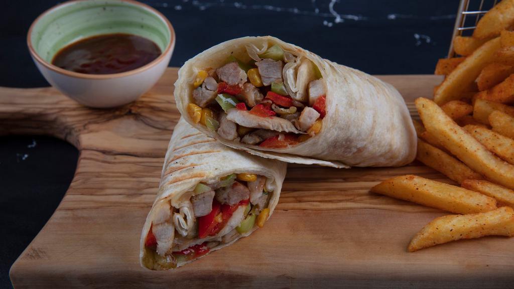 Sicilian Wrap · Grilled chicken with peppers, onion, ranch dressing, deli chips, and pickles. A choice of wrap is required.