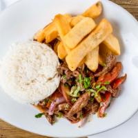 Saltado · Choice of protein, sautéed onions, tomatoes, soy sauce, fries and white rice.