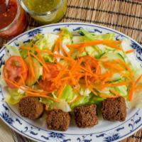 Falafel  · Vegetarian.  deep-fried ball made from ground chickpeas, spices and herbs.