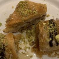 Baklava · 3 pieces of flakey pastry topped with honey (contains nuts).