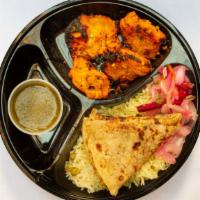 Chicken Tikka Kebab · Served with salad, rice and bread.