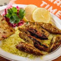 Lamb Seekh Kebab · Served with salad, rice and bread
