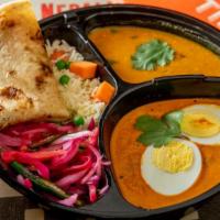 Egg Tikka Masala Box · New !! Served with salad, daal, rice and bread.
