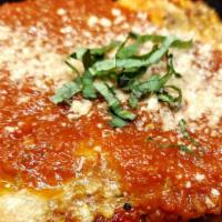 Lasagna Bolognese Al Forno · Baked fresh pasta layers with ground beef, tomato sauce, ricotta cheese and topped with mozz...