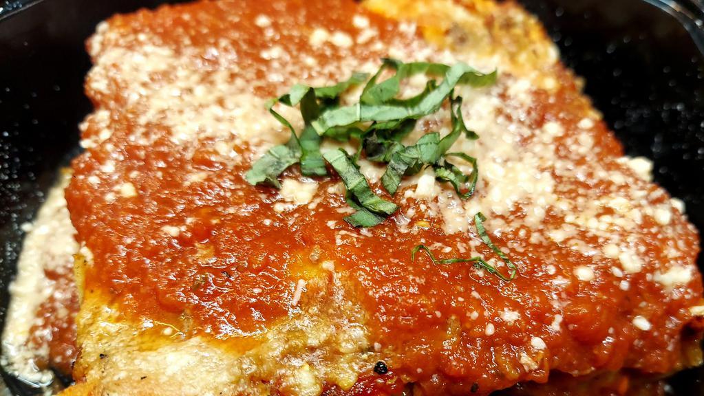 Lasagna Bolognese Al Forno · Baked fresh pasta layers with ground beef, tomato sauce, ricotta cheese and topped with mozzarella cheese.