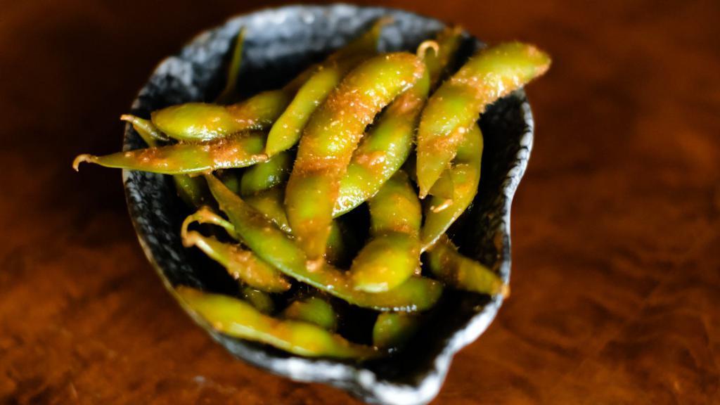 Sweet & Spicy Miso Edamame · Seared and tossed with spicy miso.