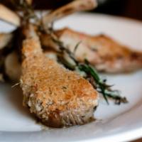 Rack Of Lamb · Marinated in garlic, rosemary and thyme and lightly encrusted with panko and served over was...